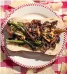  ?? Tribune News Service ?? ■ Philly-Style Broccoli Rabe, Portobello and Cheese Sandwich.