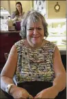  ?? JESSICA TUNIS VIA AP ?? Linda Tunis sits in a cafe in Petaluma, Calif. She was trapped in her Santa Rosa home by wildfires.