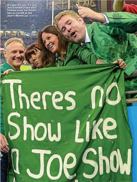  ?? SPORTSFILE ?? It’s you, it’s you, it’s you: Joe Schmidt poses with Ireland (and Joe Dolan) fans in Cardiff at last year’s World Cup