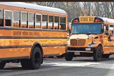  ?? PHOTOS BY FRED SQUILLANTE/COLUMBUS DISPATCH ?? The Groveport Madison school district recently suspended its busing services for two weeks due to a COVID-19 outbreak among employees.