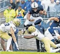  ?? AP FILE ?? Ex-Penn State running back Saquon Barkley has the ability to carry an NFL offense and could be a Pro Bowler in his rookie season if paired with a solid offensive line.