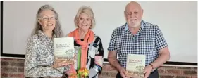  ?? Picture: FAITH QINGA ?? TRIBUTE TO GROUND-BREAKING NATURALIST: ‘Burchell's African Odyssey’ authors Marion Whitehead, left, and Roger Stewart pose with copies of their new book at the launch facilitate­d by Sue Gordon, centre, at the Don Powis Hall recently