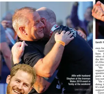  ?? DIMITRIS LEGAKIS ?? Alfie with husband Stephen at the Ironman Wales 2019 event in Tenby at the weekend Gareth ‘Alfie’ Thomas reacts