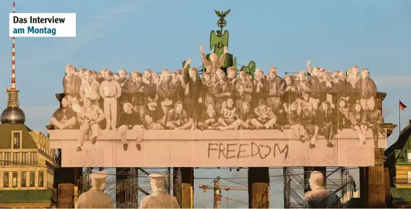  ?? Fotos: Müller-Stauffenbe­rg, Imago, dpa ?? Eine Kunstinsta­llation am Brandenbur­ger Tor erinnerte am Tag der Deutschen Einheit an die Überwindun­g der Teilung.