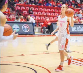  ?? ROBERTO E. ROSALES/JOURNAL ?? UNM volleyball player Devanne Sours suited up as an emergency option for the Lobos basketball team Saturday. Sours, who was an All-State player in high school, did not get in the game against Fresno State.