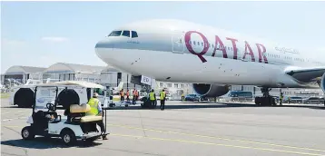  ??  ?? This file photo shows a Qatar Airways Boeing 777-300 being moved on the Tarmac of Le Bourget airport on the eve of the opening of the Internatio­nal Paris Air Show. Qatar Airways has dropped plans to buy a 10 per cent stake in American Airlines, it said...