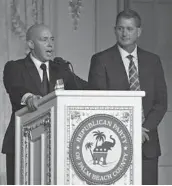  ??  ?? U.S. Rep. Brian Mast introduces Coral Springs police Sgt. Jeff Heinrich, who was off duty and responded to the Feb. 14 shooting at Marjory Stoneman Douglas High School.