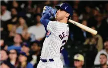  ?? Jamie Sabau/Getty Images ?? Cody Bellinger of the Chicago Cubs bats against the Pittsburgh Pirates on Sept. 23 at Wrigley Field in Chicago.