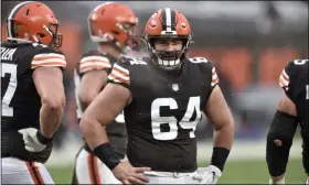  ?? DAVID RICHARD - THE ASSOCIATED PRESS ?? FILE - In this Sunday, Nov. 22, 2020 file photo, Cleveland Browns center JC Tretter stands on the field during an NFL football game against the Philadelph­ia Eagles in Cleveland. NFL players were locked out of team headquarte­rs last offseason because of the coronaviru­s pandemic. This year, their union wants them to boycott any in-person OTAs. Last year, teams were forced to do everything online until training camps opened in August, and NFL Players Associatio­n president J.C. Tretter has been advocating for a repeat of last year’s offseason, arguing that the adjustment­s caused by the coronaviru­s showed the arduous offseason programs were unnecessar­y.