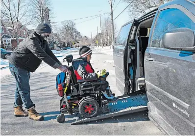  ?? JOHN RENNISON THE HAMILTON SPECTATOR ?? Mutasim Saeed, 9, with his dad Mutaz Arbab. Arbab said sometimes he has to pick up his son, who has spinal muscular atrophy, from school early because there are not enough EAs to support him.