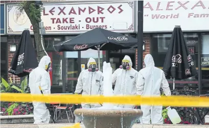  ?? RENÉ JOHNSTON/TORONTO STAR ?? Hazmat staff work on Monday at the Alexander the Great Parkette, one of the sites where a gunman fired shots Sunday night.