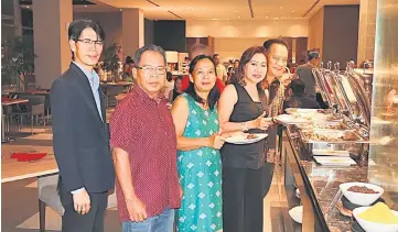  ??  ?? Lian (left) with some of the diners: (from right) Panding Semat and wife Dayssi, Ida and husband William Ubang – from Parti Rakyat Sarawak PRS, Lambir.