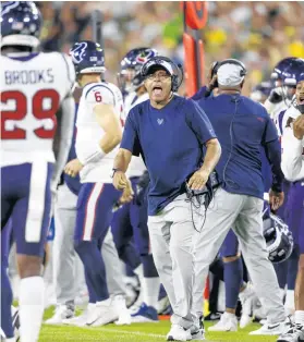  ?? JEFFREY PHELPS/AP ?? Texans head coach David Culley yells instructio­ns during a preseason game against the Packers on Aug. 14 in Green Bay, Wis.