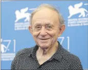  ?? DAVID AZIA — AP PHOTO ?? Frederick Wiseman poses for photograph­ers during the photo call for the Golden Lion Career Award during the 71st edition of the Venice Film Festival in Venice, Italy, Aug. 29, 2014.