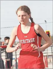  ?? Scott Herpst ?? Heritage’s Piper Collins captured the 1600 to help the Lady Generals win the girls’ meet at LFO last Monday. The Heritage boys would complete the sweep.