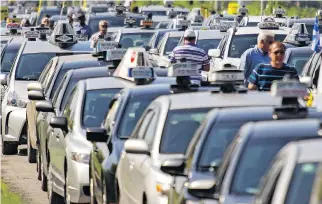  ?? JOHN MAHONEY/MONTREAL GAZETTE FILES ?? Collective­ly, taxi companies and their drivers have not cut a sympatheti­c figure over the years, with their obstinance and attitude, Basem Boshra writes.