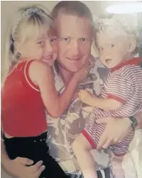  ??  ?? Corporal Dewi Pritchard with his two children