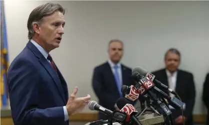  ??  ?? Oklahoma attorney general Mike Hunter speaks to the media at a news conference following closing arguments in Oklahoma’s ongoing opioid drug lawsuit against Johnson & Johnson. Photograph: Sue Ogrocki/AP