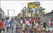  ?? SANTOSH KUMAR/HT ?? Protesters stop a train in Patna during a nationwide bandh called by Dalit organisati­ons on Monday.