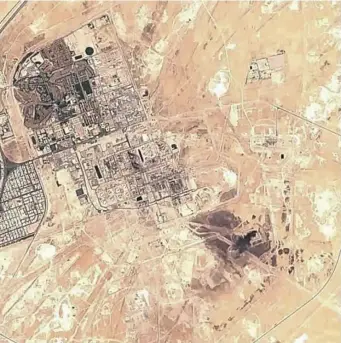  ?? EUROPEAN COMMISSION VIA AP ?? DAMAGED: A satellite image shows damage to Saudi Aramco’s facility in Buqyaq, Saudi Arabia. The drone attack on the oil facility has increased tension between Iranian President Hassan Rouhani, center at left with Russian President Vladimir Putin and Turkish Premier Recep Tayyip Erdogan, and President Trump.