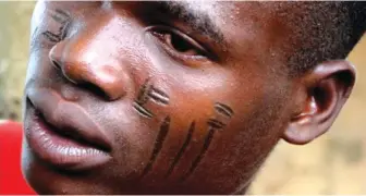  ??  ?? Some cultures in Africa value tribal tattoos