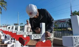  ??  ?? Greg Zanis delivers 58 crosses for the two-year anniversar­y of the Las Vegas shooting in Nevada on 1 October. Photograph: MediaPunch/REX/Shuttersto­ck
