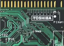  ??  ?? A LOGO of Toshiba Corp. is seen on a printed circuit board in this photo illustrati­on taken in Tokyo July 31, 2012.
