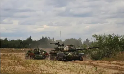  ?? ?? Belarusian tanks seen last July on manoeuvres with Wagner fighters near Brest, Belarus. Photograph: AP