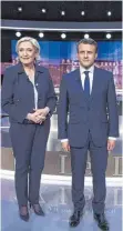  ?? FOTO: DPA ?? Marine Le Pen und Emmanuel Macron vor der Live-Debatte.