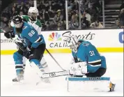  ?? MARCIO JOSE SANCHEZ — THE ASSOCIATED PRESS ?? Sharks goaltender Martin Jones stops a shot Sunday against Dallas. Jones made 26 saves in the 5-2 victory.