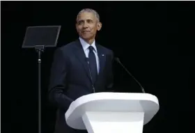  ?? PHOTO/ ?? Former U.S. President Barack Obama delivers his speech at the 16th Annual Nelson Mandela Lecture at the Wanderers Stadium in Johannesbu­rg, South Africa, on Tuesday. AP THEMBA HADEBE