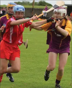  ??  ?? Lettie Whelan challenges Cork’s Michelle Fitzpatric­k.