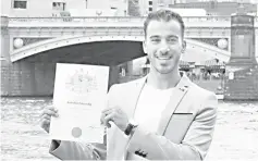  ??  ?? Al Araibi receives his Australian citizenshi­p during a ceremony at Federation Square in Melbourne. — Reuters photo