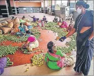  ?? PTI ?? A security personnel screens workers at Kanaka Durga temple in Vijayawada on Thursday.