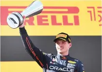  ?? ?? Max Verstappen celebrates on the podium after his triumph