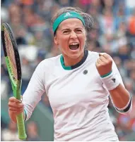  ?? ASSOCIATED PRESS ?? Jelena Ostapenko is all fired up after she scores a point against Caroline Wozniacki during her 4-6, 6-2, 6-2 victory.