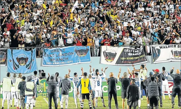  ?? Picture: MICHAEL PINYANA ?? ALL STILL IN LIMBO: Chippa United players wave to their supporters during a match at Sisa Dukashe Stadium in Mdantsane last year. At this stage of negotiatio­ns between Buffalo City Metro and the club has not made much headway
