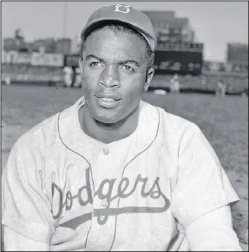  ?? AP ?? This is an April 18, 1948, portrait of Brooklyn Dodgers baseball player Jackie Robinson. The first statue in Dodger Stadium history belongs to Robinson. The team will unveil his likeness during festivitie­s today with his wife and extended family in...