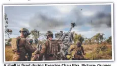  ?? ?? A shell is fired during Exercise Chau Pha. Picture: Gunner Gregory Scott