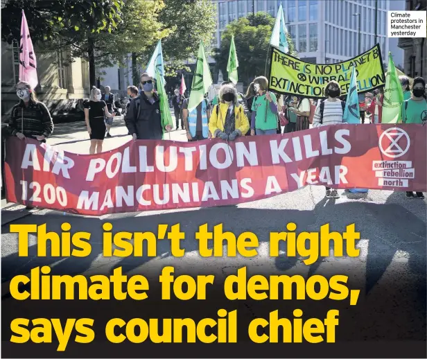  ??  ?? Climate protestors in Manchester yesterday