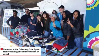  ??  ?? Residents at the Culemborg Safe Space receive clothing and other essentials on arrival.