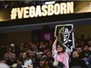  ?? David Becker / Associated Press 2018 ?? Could this fan at a Golden Knights game three years ago someday be cheering at an A’s game in Las Vegas?