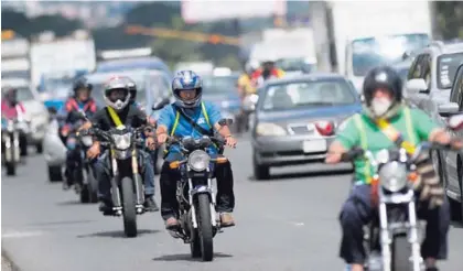  ?? JOSÉ CORDERO ?? La ampliación del monto de cobertura médica del SOA implica, según el INS, que la tarifa de la póliza se duplique en el caso de los motociclis­tas y crezca 70% para el resto de vehículos.