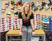  ??  ?? Christina Stang, owner of Fritzy’s Roller Skate Shop, avoided selling on Amazon due to its fees, but now Google has suspended her account.