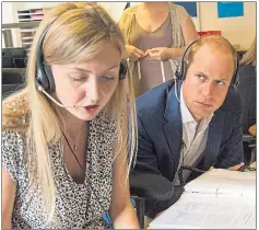  ??  ?? Pensive...Prince William listens in on a call to the helpline