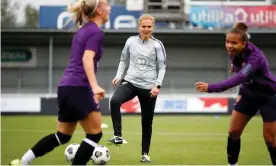  ?? Photograph: Lynne Cameron/The FA/Getty Images ?? Sarina Wiegman watches a training session ahead of her first game in charge.