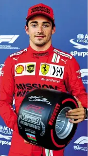  ??  ?? Charles Leclerc celebrates his pole position in Baku. Shell’s logo is prominent on his overalls, and the oil company has been a technical partner of the Scuderia for many years