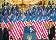  ?? JABIN BOTSFORD/WASHINGTON POST ?? President Donald Trump, with first lady Melania Trump and Vice President Mike Pence, speaks during an election-night event at the White House in 2020.