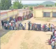  ?? DIWAKAR PRASAD/HT FILE ?? People stand in queue at polling booth in Giridih Lok Sabha seat, which is a Maoist-infested area, on May 12.