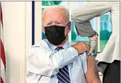  ?? EVAN VUCCI / AP FILE ?? President Joe Biden receives a COVID-19 booster shot during an event in the South Court Auditorium on the White House campus on Sept. 27 in Washington.